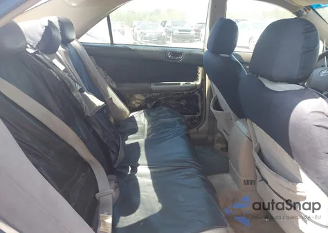 2005 Toyota Camry Le z USA, uszkodzony, nr VIN 4T1BE32K65U429973